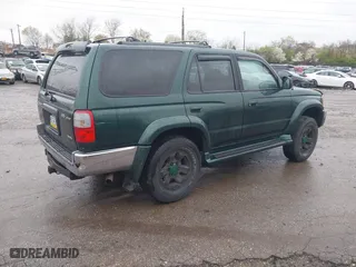 2000 Toyota 4Runner SR5 with VIN JT3HN86R9Y0294975, listed as a IAAI auction lot 41985007 with 218,761 mi miles. Bid and sale history available at carsss.com. Image 4.