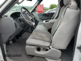 2003 Ford F-150 XL with VIN 1FTRX18L33NA43522, listed as a Copart auction lot 61197615 with 101,061 mi miles and Salvage title. Bid and sale history available at DreamBid. Image 7.