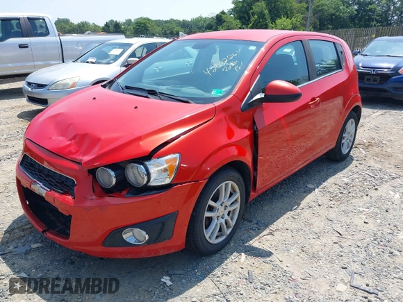 2012 Chevrolet Sonic LT with VIN 1G1JC6SH9C4128132, listed as a IAAI auction lot 42632261 with 160,029 mi miles and . Bid and sale history available at DreamBid. Image 2.