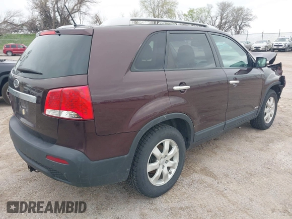 2011 Kia Sorento LX with VIN 5XYKTCA11BG070046, listed as a IAAI auction lot 42136751 with 112,661 mi miles and . Bid and sale history available at DreamBid. Image 4.