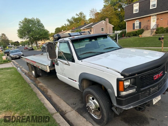 2000 GMC Sierra 1500 with VIN 1GDKC34F9YF421333, listed as a Copart auction lot 57167145 with 120,490 mi miles and Clean Title. Bid and sale history available at DreamBid. Image 1.