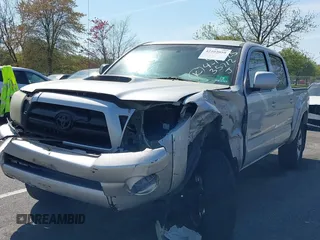 2006 Toyota Tacoma PreRunner z VIN 5TEJU62N66Z235712, wystawiony jako IAAI lot #42102058 z przebiegiem 264 012 mil mil oraz . Historia ofert i sprzedaży dostępna na DreamBid. Obrazek 2.