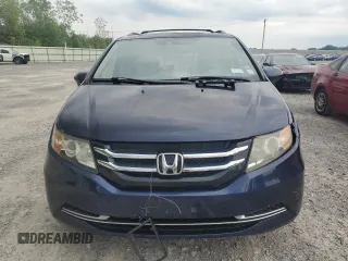 2014 Honda Odyssey EX-L with VIN 5FNRL5H63EB013483, listed as a Copart auction lot 63002435 with 127,059 mi miles and Salvage title. Bid and sale history available at DreamBid. Image 5.