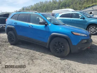 2018 Jeep Cherokee Trailhawk with VIN 1C4PJMBB4JD502876, listed as a Copart auction lot 54235325 with 87,635 mi miles and Salvage title. Bid and sale history available at DreamBid. Image 4.