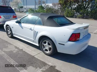 2004 Ford Mustang Deluxe with VIN 1FAFP44654F181293, listed as a IAAI auction lot 41831366 with 122,636 mi miles. Bid and sale history available at carsss.com. Image 3.