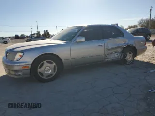 2000 Lexus LS 400 with VIN JT8BH28F3Y0170580, listed as a Copart auction lot 80991694 with 174,041 mi miles and Salvage Title. Bid and sale history available at carsss.com. Image 1.