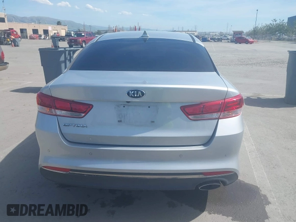 2018 Kia Optima LX with VIN 5XXGT4L31JG267716, listed as a IAAI auction lot 41890611 with 63,491 mi miles and . Bid and sale history available at carsss.com. Image 16.