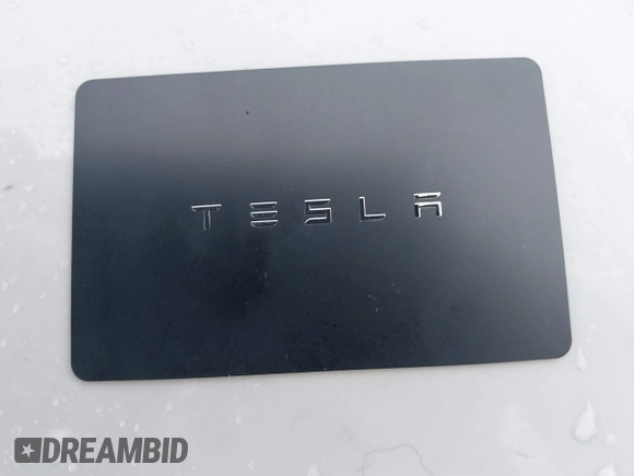 2018 Tesla Model 3 Long Range Battery with VIN 5YJ3E1EA3JF013253, listed as a IAAI auction lot 41752102 with 84,459 mi miles. Bid and sale history available at carsss.com. Image 11.