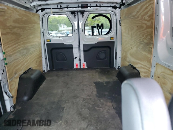 2015 Ford Transit Cargo z VIN 1FTNR1YM7FKB03812, wystawiony jako Copart lot #56453835 z przebiegiem 139 412 mil mil oraz Czysty tytuł • Clean title. Historia ofert i sprzedaży dostępna na DreamBid. Obrazek 10.