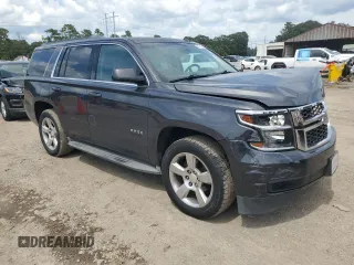 2015 Chevrolet Tahoe LT with VIN 1GNSCBKC1FR240186, listed as a Copart auction lot 64741425 with 110,357 mi miles and Salvage title. Bid and sale history available at DreamBid. Image 4.