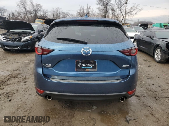 2018 Mazda CX-5 Touring with VIN JM3KFBCM0J0363036, listed as a Copart auction lot 47085755 with 61,928 mi miles and Salvage Title. Bid and sale history available at DreamBid. Image 6.