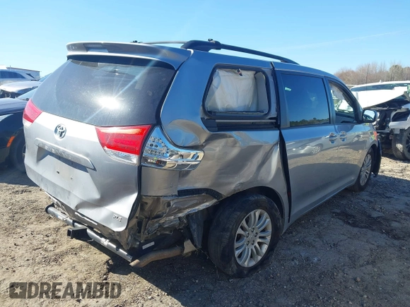 2011 Toyota Sienna XLE AAS with VIN 5TDYK3DC5BS039959, listed as a IAAI auction lot 41803881 with 129,479 mi miles. Bid and sale history available at carsss.com. Image 4.