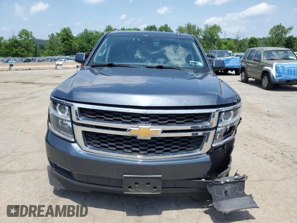2020 Chevrolet Tahoe LT with VIN 1GNSKBKC0LR260766, listed as a Copart auction lot 61465725 with 104,850 mi miles and Salvage title. Bid and sale history available at DreamBid. Image 5.