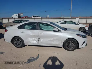 2022 Kia Forte LXS z VIN 3KPF24AD7NE479402, wystawiony jako IAAI lot #41629995 z przebiegiem 54 864 mil mil oraz . Historia ofert i sprzedaży dostępna na DreamBid. Obrazek 13.