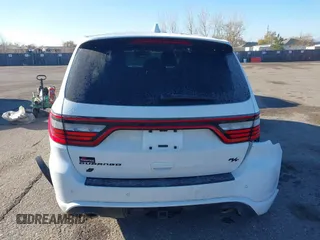 2021 Dodge Durango R/T with VIN 1C4SDJCT4MC663939, listed as a IAAI auction lot 40950558 with 52,054 mi miles and . Bid and sale history available at DreamBid. Image 16.