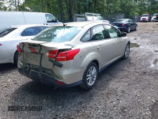 2017 Ford Focus SE with VIN 1FADP3F2XHL304752, listed as a IAAI auction lot 42492195 with 72,142 mi miles and . Bid and sale history available at DreamBid. Image 4.