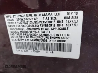 2010 Honda Ridgeline RTL with VIN 5FPYK1F57AB005602, listed as a IAAI auction lot 42208633 with 106,777 mi miles and . Bid and sale history available at DreamBid. Image 9.