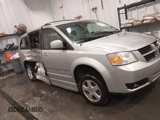 2010 Dodge Grand Caravan SXT with VIN 2D4RN5D15AR261319, listed as a IAAI auction lot 41877022 with 142,292 mi miles and . Bid and sale history available at DreamBid. Image 13.