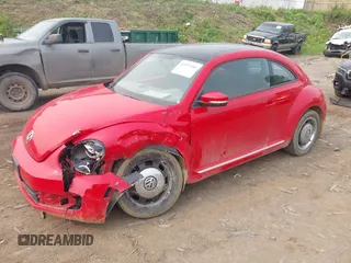 2012 Volkswagen Beetle 2.5L PZEV with VIN 3VWJP7AT8CM637489, listed as a IAAI auction lot 42377559 with 174,295 mi miles and . Bid and sale history available at DreamBid. Image 2.