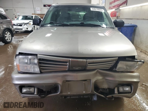 2001 Oldsmobile Bravada z VIN 1GHDT13W212196750, wystawiony jako Copart lot #44019065 z przebiegiem 126 878 mil mil oraz Szkody całkowita. Historia ofert i sprzedaży dostępna na DreamBid. Obrazek 5.