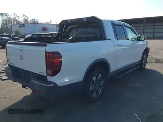 2018 Honda Ridgeline RTL-E with VIN 5FPYK3F71JB001753, listed as a IAAI auction lot 41510248 with 84,551 mi miles and . Bid and sale history available at DreamBid. Image 4.