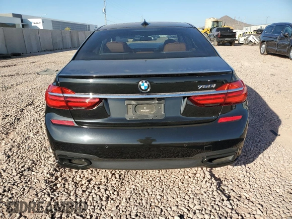 2018 BMW 7 Series 750i with VIN WBA7F0C57JGM23040, listed as a Copart auction lot 87392704 with 0 mi miles and Salvage Title. Bid and sale history available at carsss.com. Image 6.