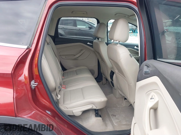 2014 Ford Escape Titanium with VIN 1FMCU9J92EUE01077, listed as a IAAI auction lot 41642337 with 26,002 mi miles. Bid and sale history available at carsss.com. Image 8.