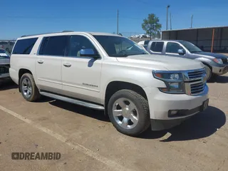 2015 Chevrolet Suburban LTZ with VIN 1GNSCKKC3FR113388, listed as a IAAI auction lot 41867964 with 238,530 mi miles and . Bid and sale history available at DreamBid. Image 1.