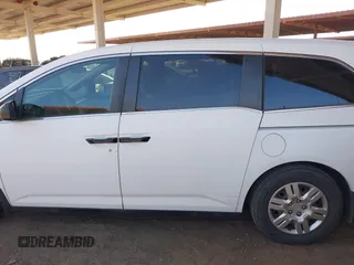 2013 Honda Odyssey LX with VIN 5FNRL5H2XDB028879, listed as a IAAI auction lot 41958988 with 49,868 mi miles and . Bid and sale history available at carsss.com. Image 14.