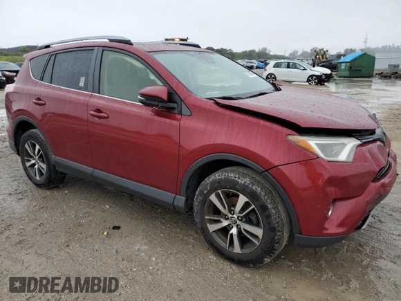2018 Toyota RAV4 XLE with VIN JTMWFREV0JD130324, listed as a Copart auction lot 41790875 with 236,109 mi miles and Salvage title. Bid and sale history available at DreamBid. Image 4.