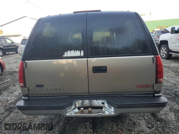 1999 GMC Suburban with VIN 3GKEC16R4XG536985, listed as a Copart auction lot 73421824 with 181,327 mi miles and Clean title. Bid and sale history available at DreamBid. Image 6.