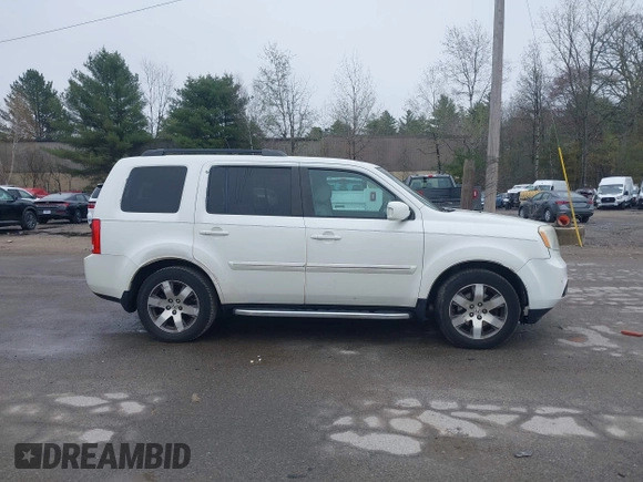 2013 Honda Pilot Touring with VIN 5FNYF4H95DB011661, listed as a IAAI auction lot 42101104 with 298,004 mi miles and . Bid and sale history available at carsss.com. Image 13.