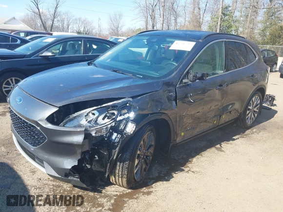 2020 Ford Escape Titanium Hybrid z VIN 1FMCU0DZ7LUB57978, wystawiony jako IAAI lot #41570242 z przebiegiem 32 819 mil mil oraz . Historia ofert i sprzedaży dostępna na DreamBid. Obrazek 6.