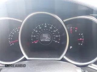 2015 Kia Optima LX with VIN KNAGM4A77F5568339, listed as a IAAI auction lot 42695740 with 135,632 mi miles and . Bid and sale history available at DreamBid. Image 7.