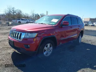 2012 Jeep Grand Cherokee Laredo with VIN 1C4RJFAG7CC297757, listed as a IAAI auction lot 41901645 with 270,731 mi miles. Bid and sale history available at carsss.com. Image 2.