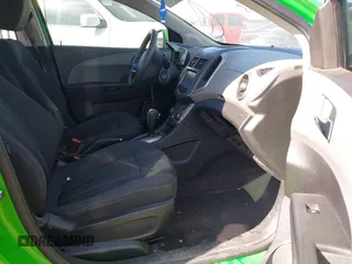 2016 Chevrolet Sonic LT with VIN 1G1JC6SH8G4150595, listed as a IAAI auction lot 41922233 with 81,335 mi miles. Bid and sale history available at carsss.com. Image 5.