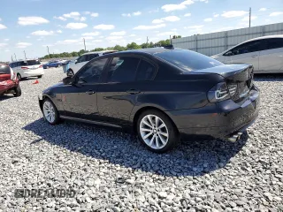 2011 BMW 3 Series 328i with VIN WBAPH7C50BE675471, listed as a Copart auction lot 52746655 with 123,179 mi miles and Salvage Title. Bid and sale history available at DreamBid. Image 2.