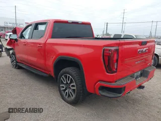 2021 GMC Sierra 1500 AT4 with VIN 3GTP9EEL1MG465554, listed as a IAAI auction lot 41279381 with 54,735 mi miles. Bid and sale history available at carsss.com. Image 3.