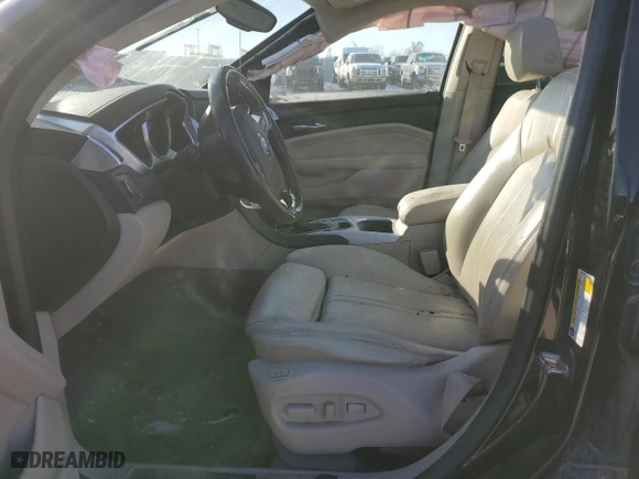 2010 Cadillac SRX Performance Collection with VIN 3GYFNBEY7AS597917, listed as a Copart auction lot 42640215 with 211,048 mi miles and Salvage Title. Bid and sale history available at carsss.com. Image 7.