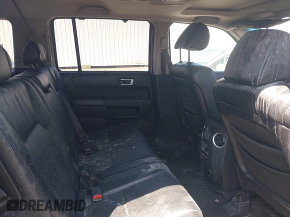 2010 Honda Pilot Touring z VIN 5FNYF4H94AB010058, wystawiony jako IAAI lot #42495313 z przebiegiem 157 306 mil mil oraz . Historia ofert i sprzedaży dostępna na DreamBid. Obrazek 8.