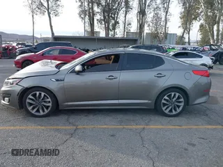 2014 Kia Optima SX Turbo with VIN 5XXGR4A63EG291596, listed as a IAAI auction lot 41385491 with 265,017 mi miles and . Bid and sale history available at DreamBid. Image 14.