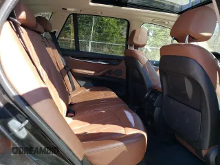 2014 BMW X5 xDrive35i z VIN 5UXKR0C57E0K47849, wystawiony jako Copart lot #42133035 z przebiegiem 134 957 mil mil oraz Szkoda całkowita • Salvage title. Historia ofert i sprzedaży dostępna na DreamBid. Obrazek 11.