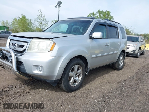 2009 Honda Pilot EX-L with VIN 5FNYF48599B025471, listed as a IAAI auction lot 42133938 with 217,105 mi miles. Bid and sale history available at carsss.com. Image 2.