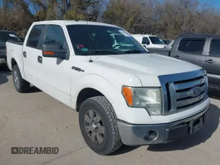 2012 Ford F-150 XL with VIN 1FTFW1CF9CFA94640, listed as a IAAI auction lot 41703729 with 216,291 mi miles. Bid and sale history available at carsss.com. Image 1.