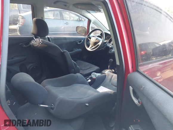 2011 Honda Fit Sport with VIN JHMGE8H55BS006252, listed as a IAAI auction lot 42132958 with 147,734 mi miles and . Bid and sale history available at DreamBid. Image 8.