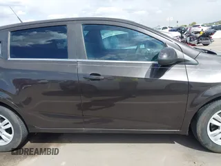2014 Chevrolet Sonic LT with VIN 1G1JC6SHXE4135948, listed as a IAAI auction lot 41949833 with 127,202 mi miles. Bid and sale history available at carsss.com. Image 14.