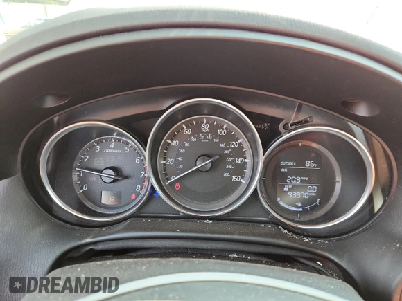 2016 Mazda CX-5 Sport with VIN JM3KE4BYXG0704194, listed as a Copart auction lot 62095735 with 93,970 mi miles and Salvage title. Bid and sale history available at DreamBid. Image 9.