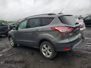 2014 Ford Escape SE z VIN 1FMCU9GXXEUB83184, wystawiony jako Copart lot #56188305 z przebiegiem 100 786 mil mil oraz Czysty tytuł • Clean title. Historia ofert i sprzedaży dostępna na DreamBid. Obrazek 2.