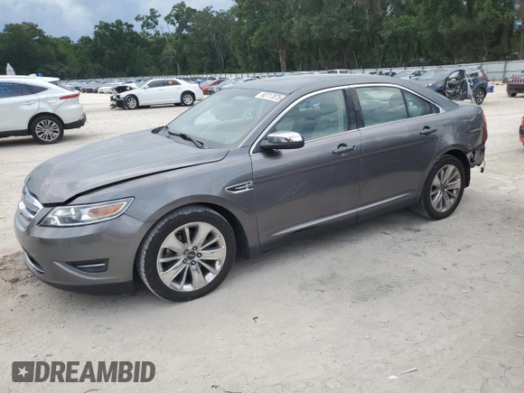 2011 Ford Taurus Limited with VIN 1FAHP2FW3BG184887, listed as a Copart auction lot 60717875 with 196,102 mi miles and Salvage title. Bid and sale history available at DreamBid. Image 1.
