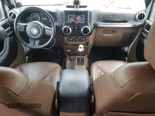 2013 Jeep Wrangler Unlimited Sahara with VIN 1C4HJWEG9DL628684, listed as a Copart auction lot 57672175 with 69,010 mi miles and Salvage title. Bid and sale history available at DreamBid. Image 8.